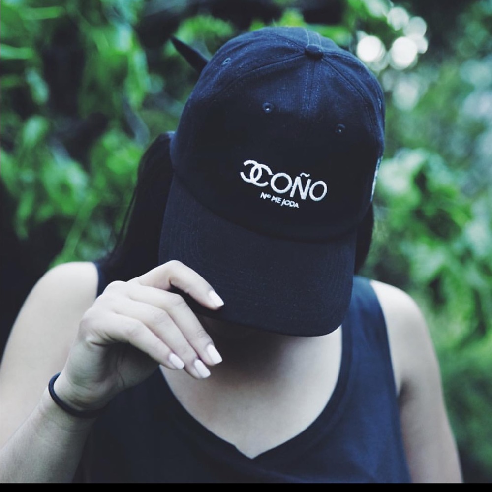 ISO!! Not selling. COÑO hat, shirt & clutch